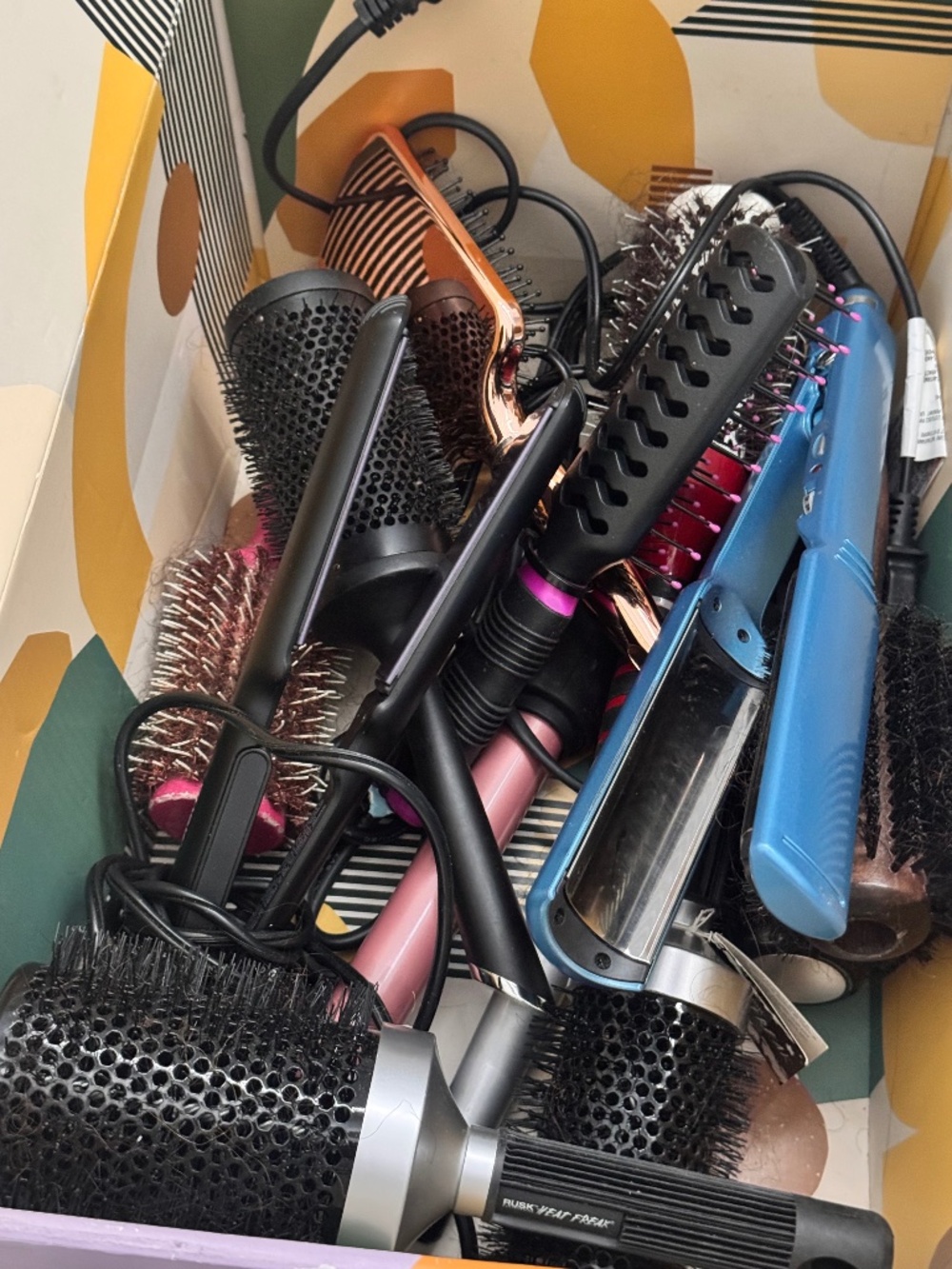 Assortment of round brushes and flat irons!